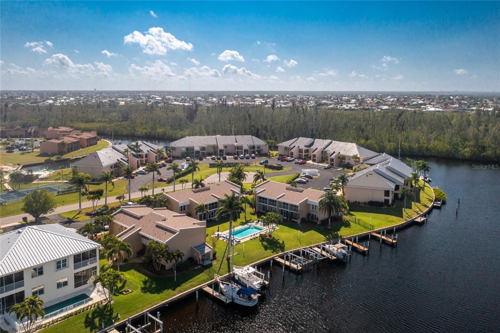 an aerial view of a house with a ocean view