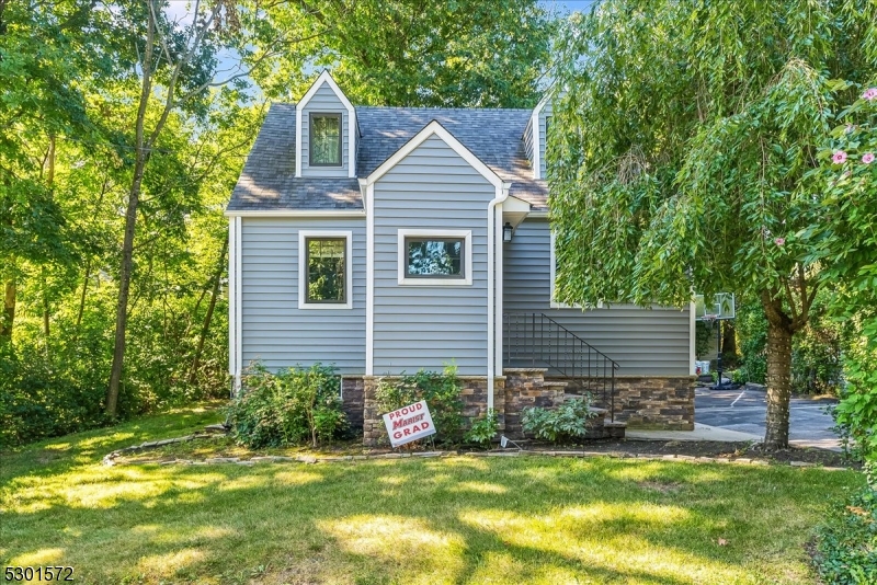 a view of a back yard of the house