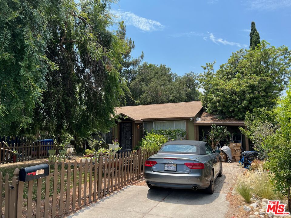 a view of house and patio