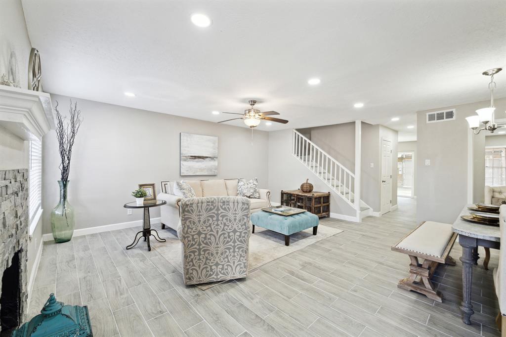 Walking through the front door, you'll immediately notice the inviting and spacious living and dining areas.