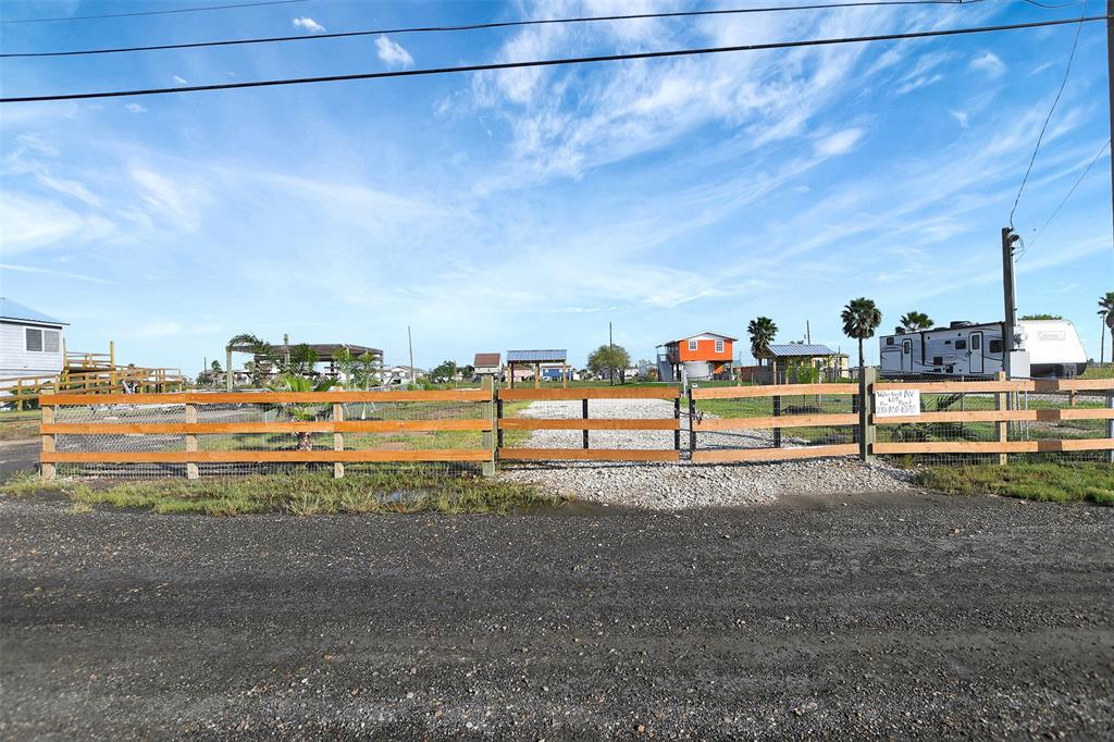 a view of a road with a yard