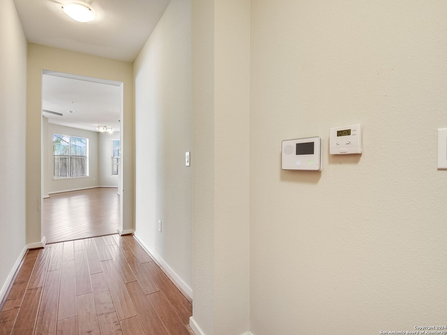 a view of a livingroom with wooden floor