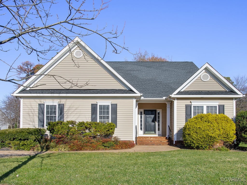 front view of a house and a yard