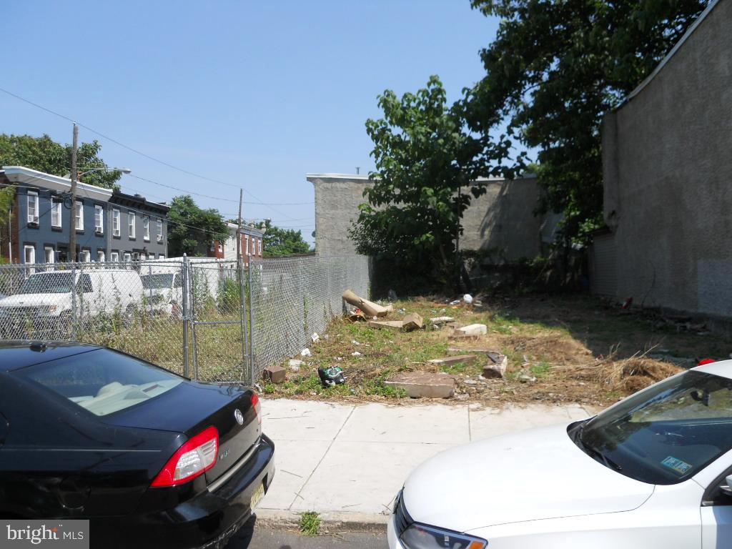 a view of outdoor space and car parked