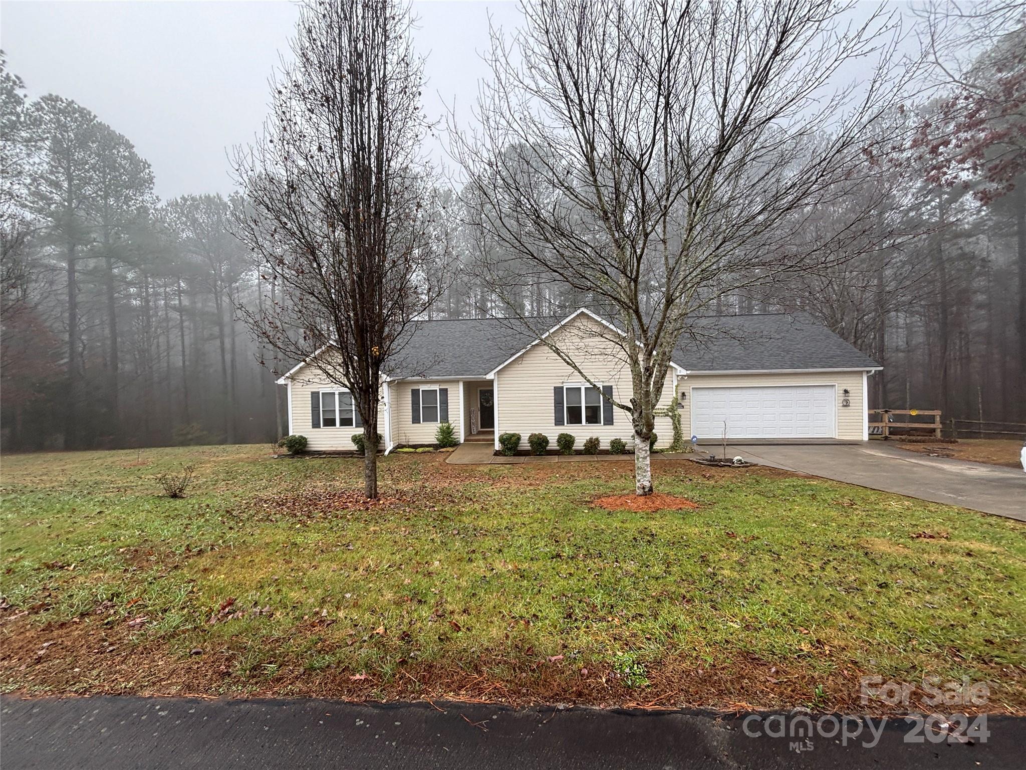 a house with trees in front of it