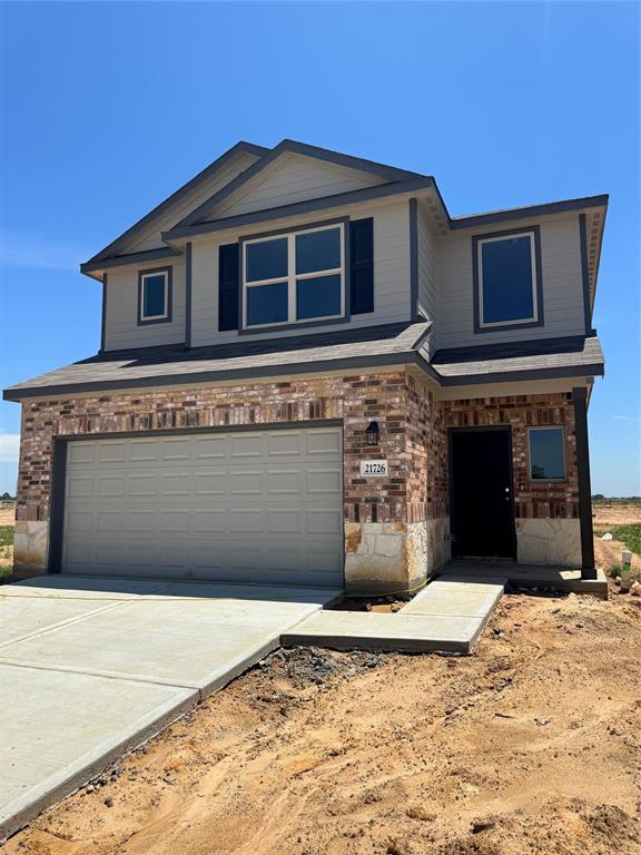 a front view of a house with a space