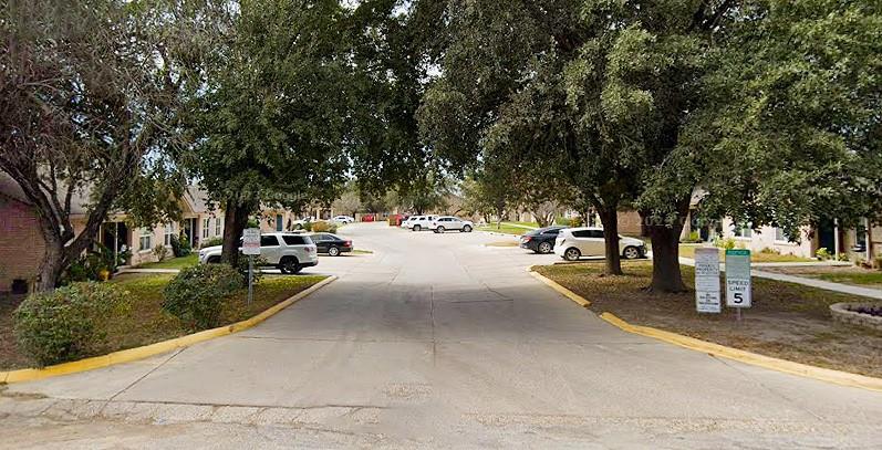 a view of road with trees