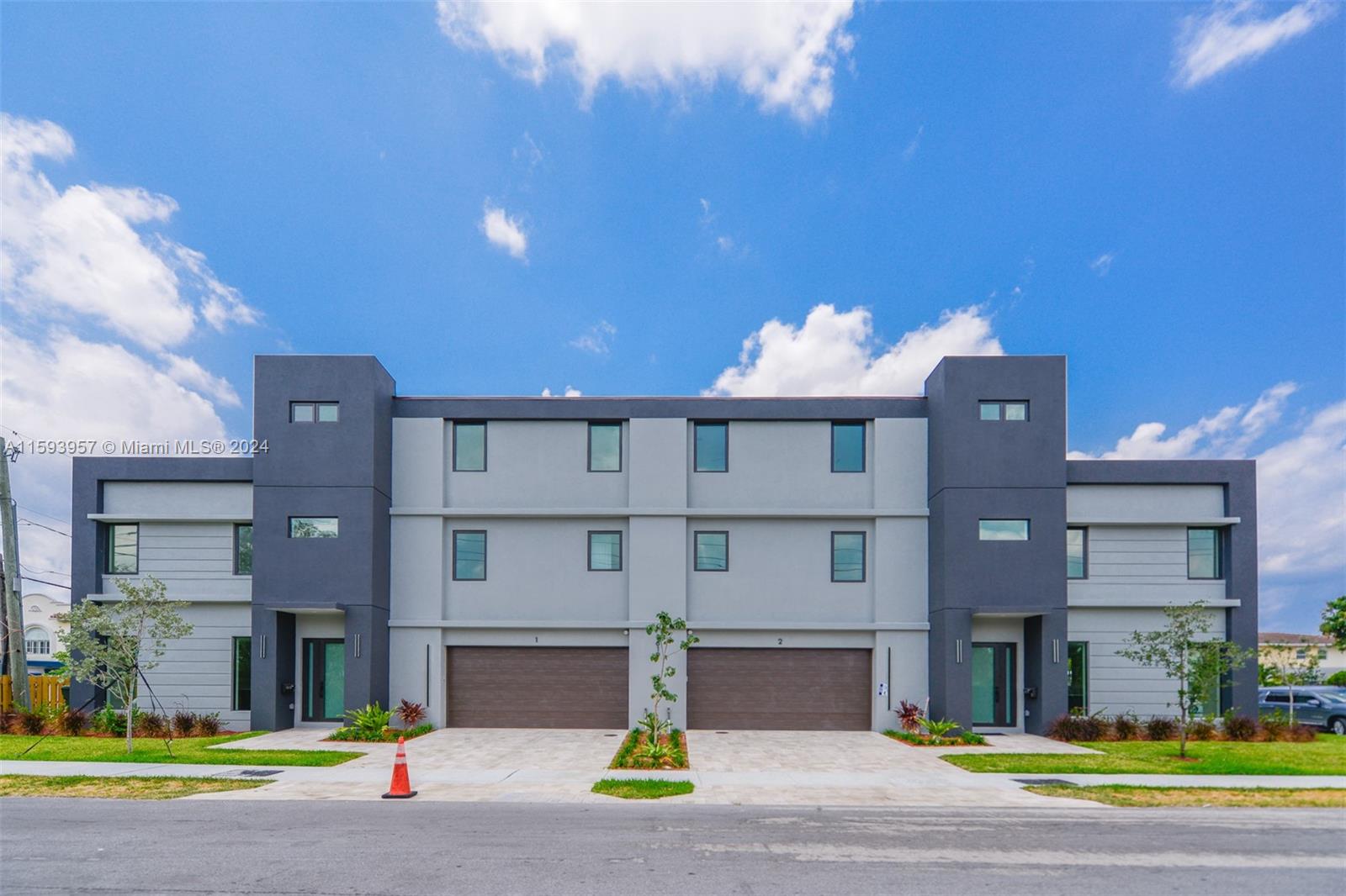 a front view of a building with street view