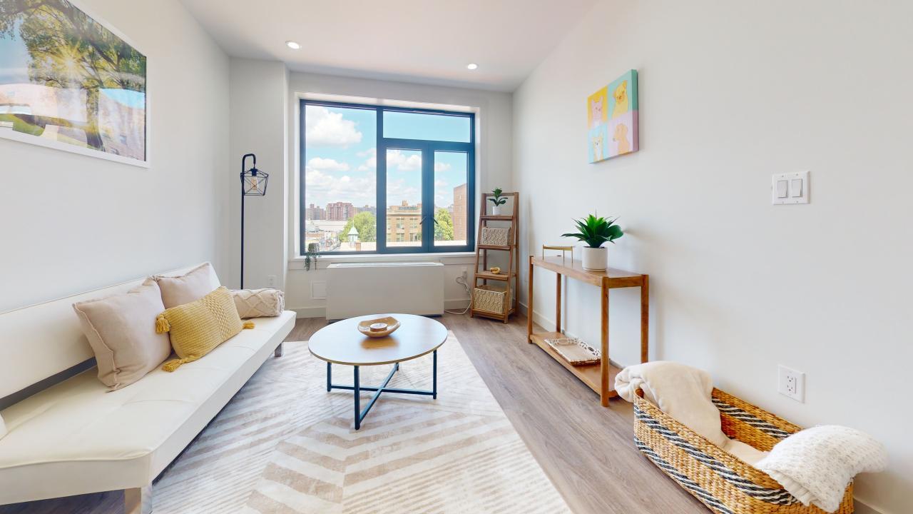 Living room with light wood-type flooring