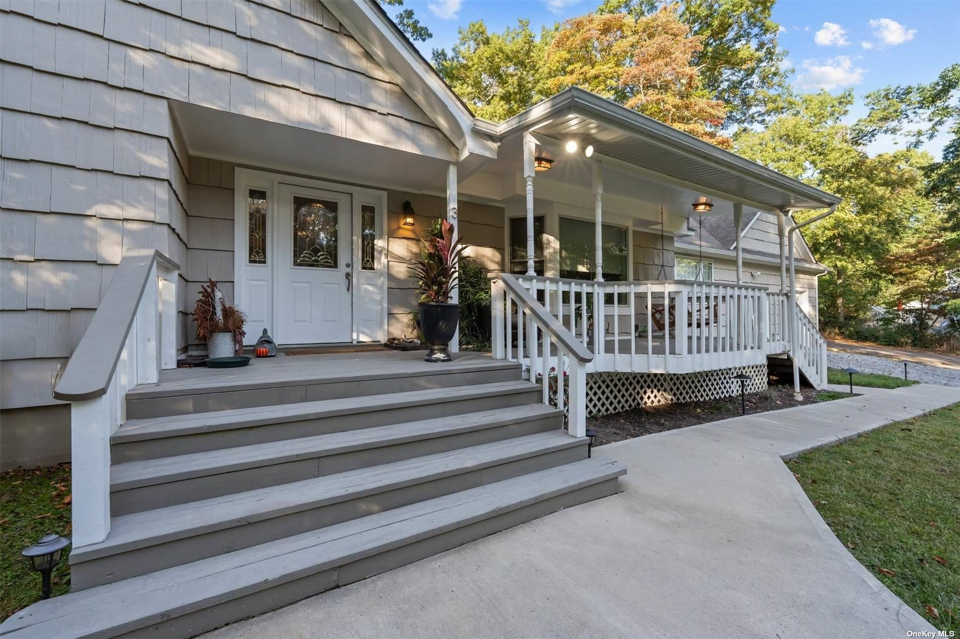 a view of porch with a bench