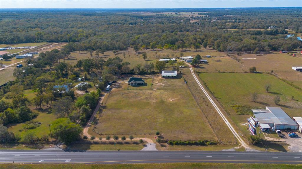 Aerial views of the home and the barn/stable situated on nearly 4 acres!