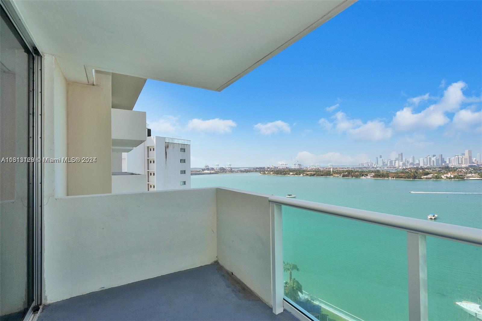 a view of a balcony with city view