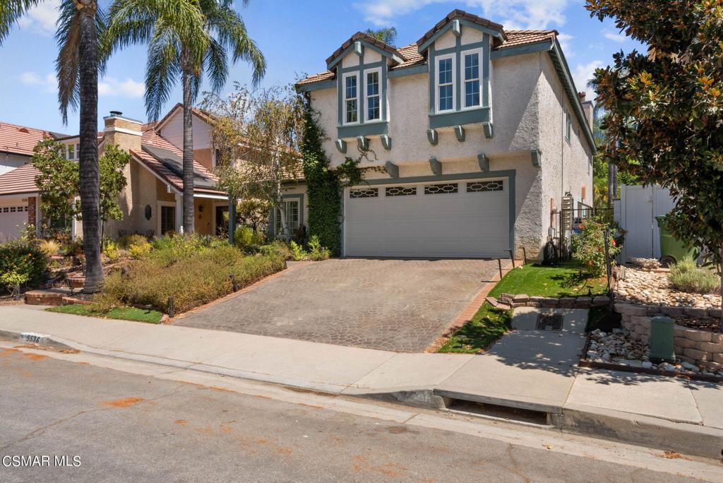 front view of house with a small yard