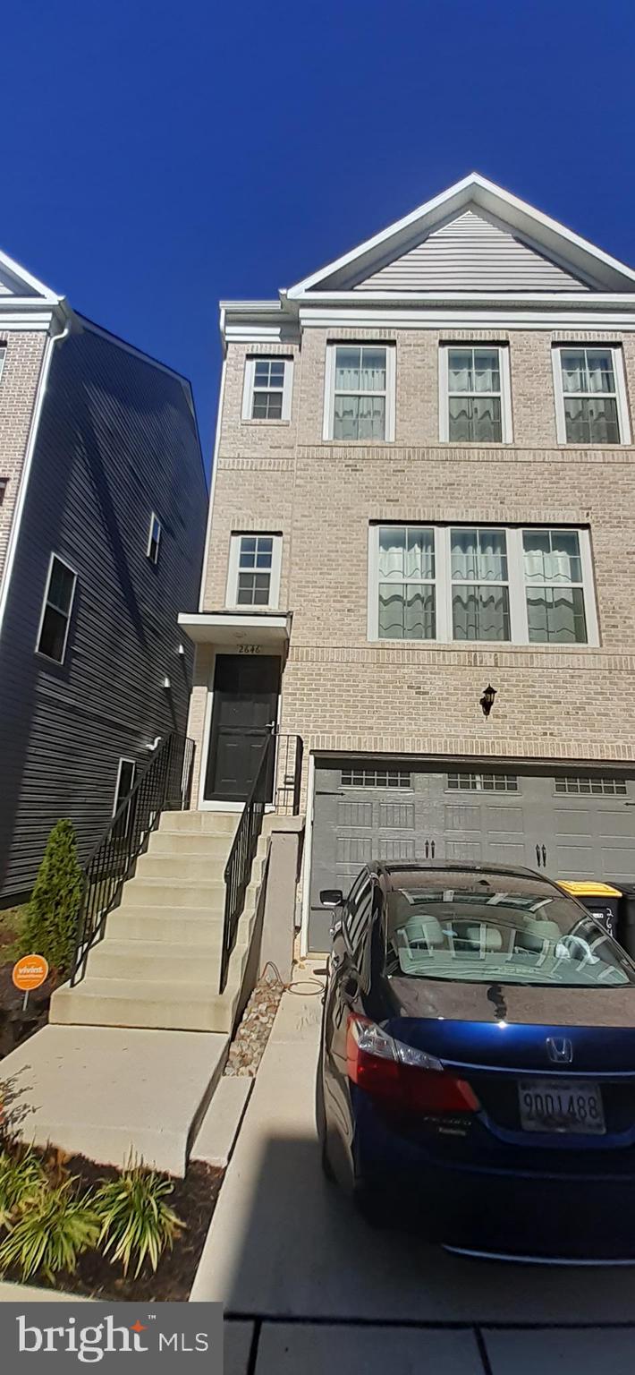 a front view of a house with balcony