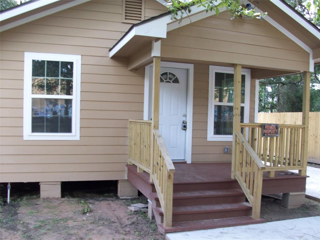 a front view of a house with a porch