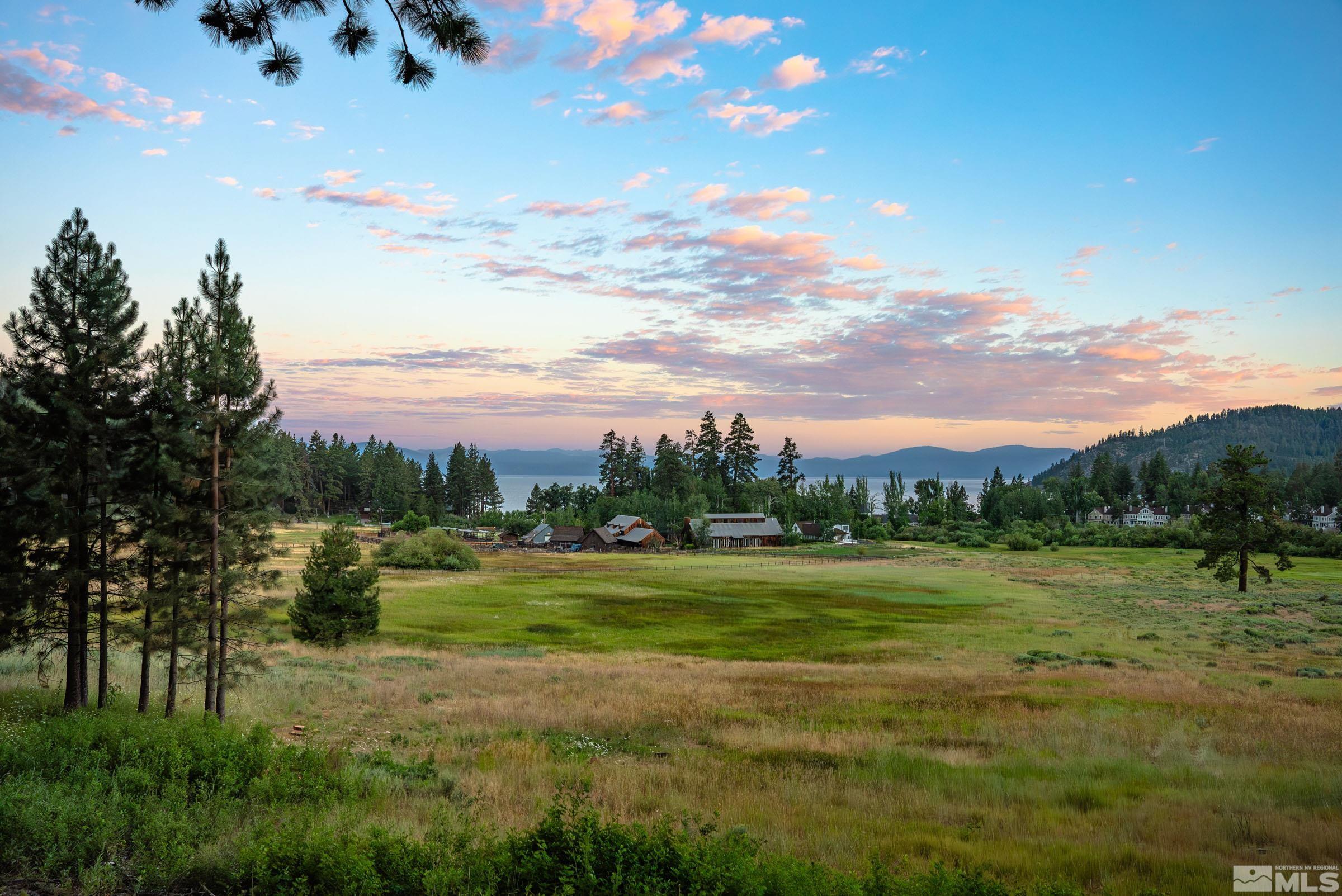 a view of a golf course with a lake