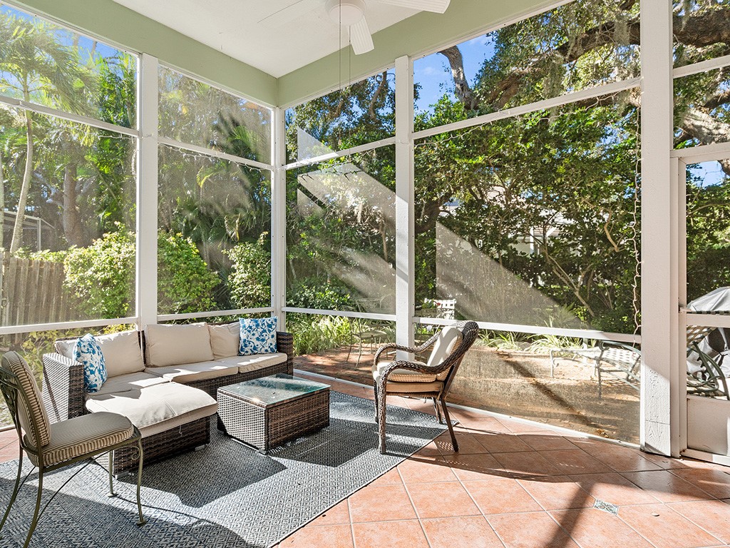 a balcony with furniture and outdoor view