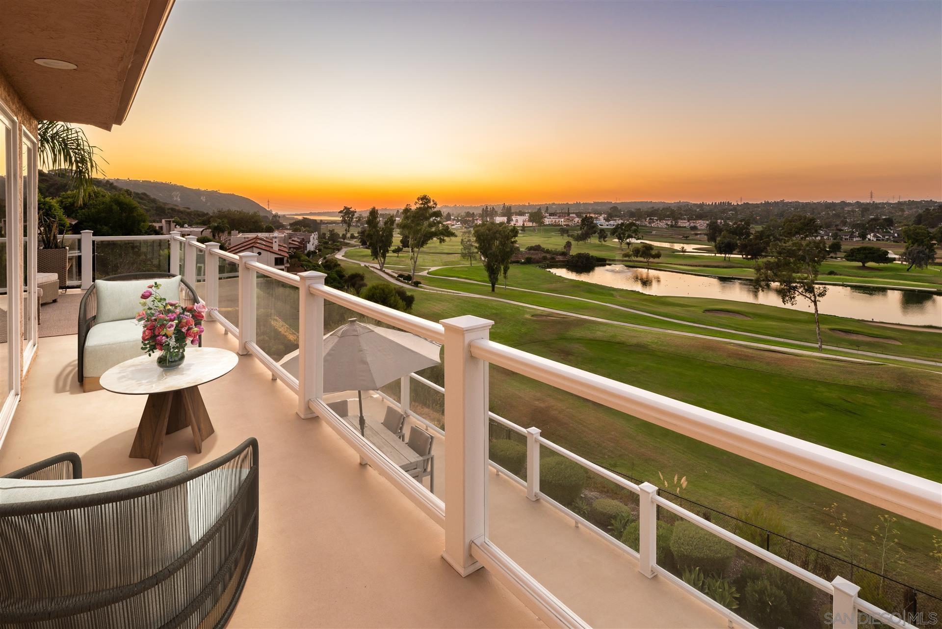 a view of a chairs and table on the terrace