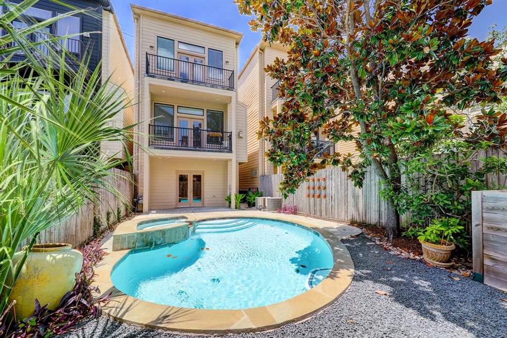 a house view with a swimming pool