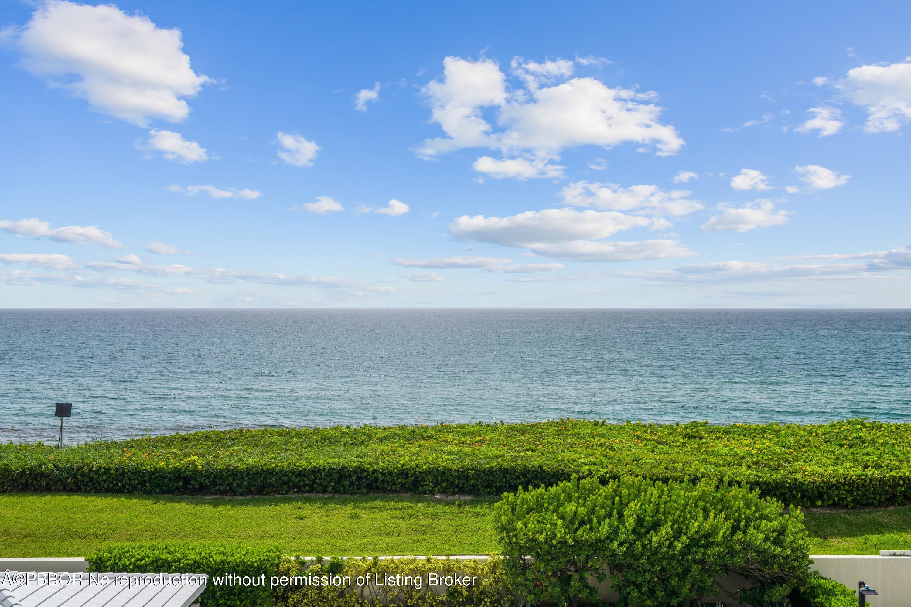 a view of a lake with a yard