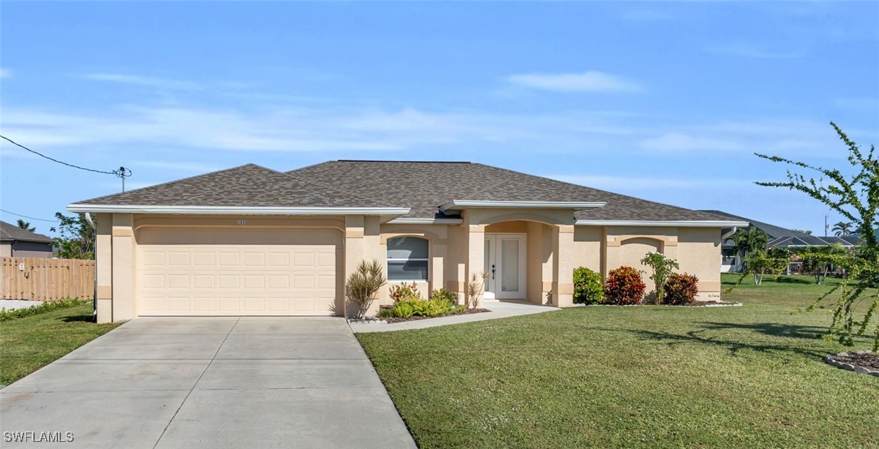 front view of a house with a yard