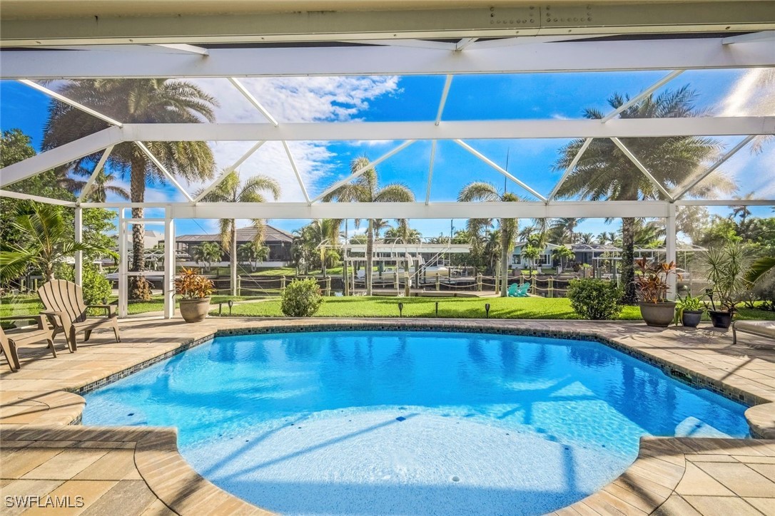 a view of a swimming pool with a patio