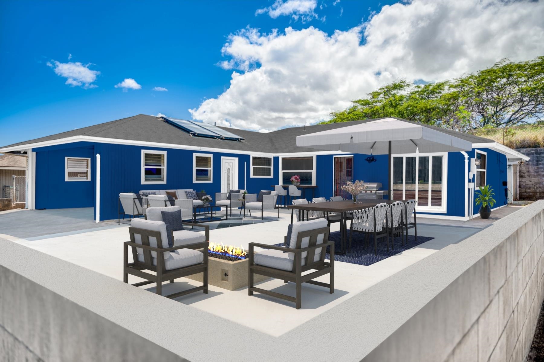 a view of a house with swimming pool and sitting area