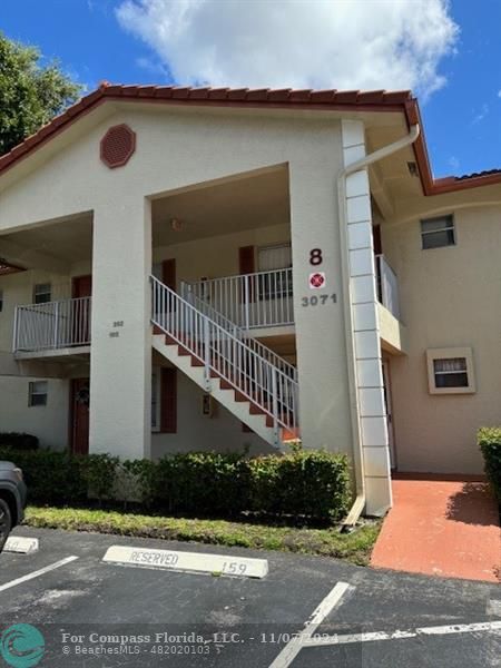 a front view of a house with yard