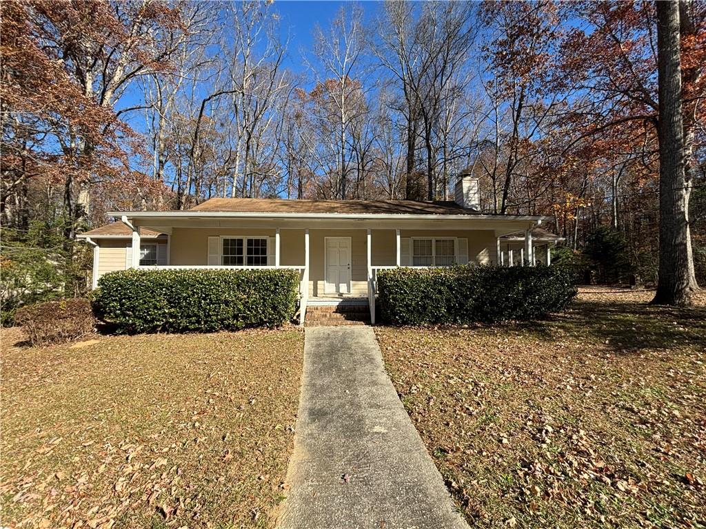 front view of a house with a yard