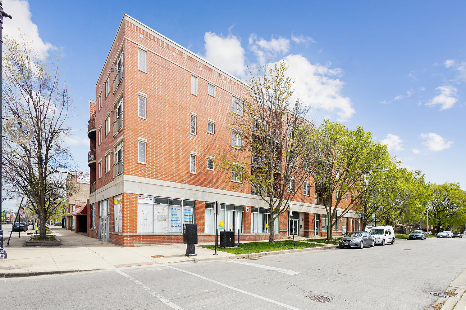 a view of a building with a street