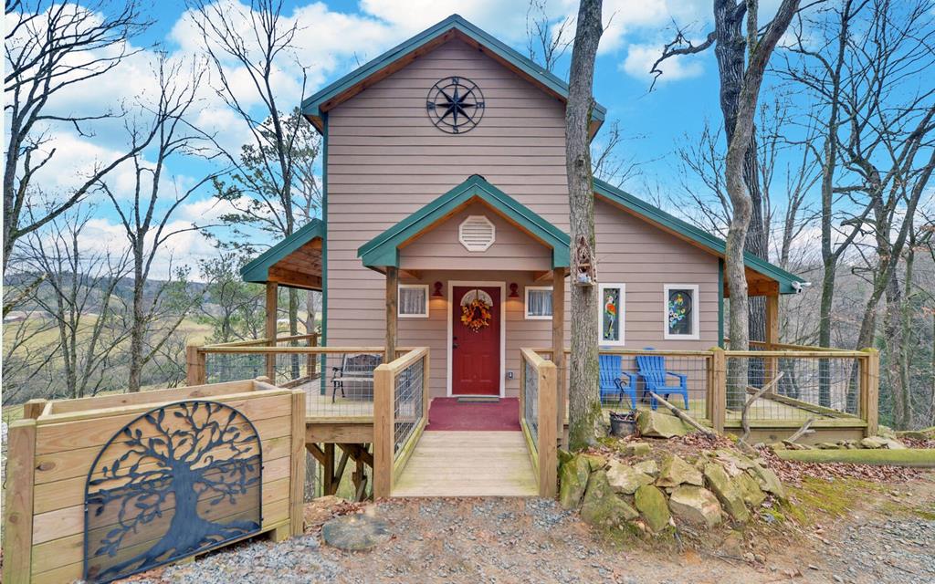 a front view of house with outdoor seating