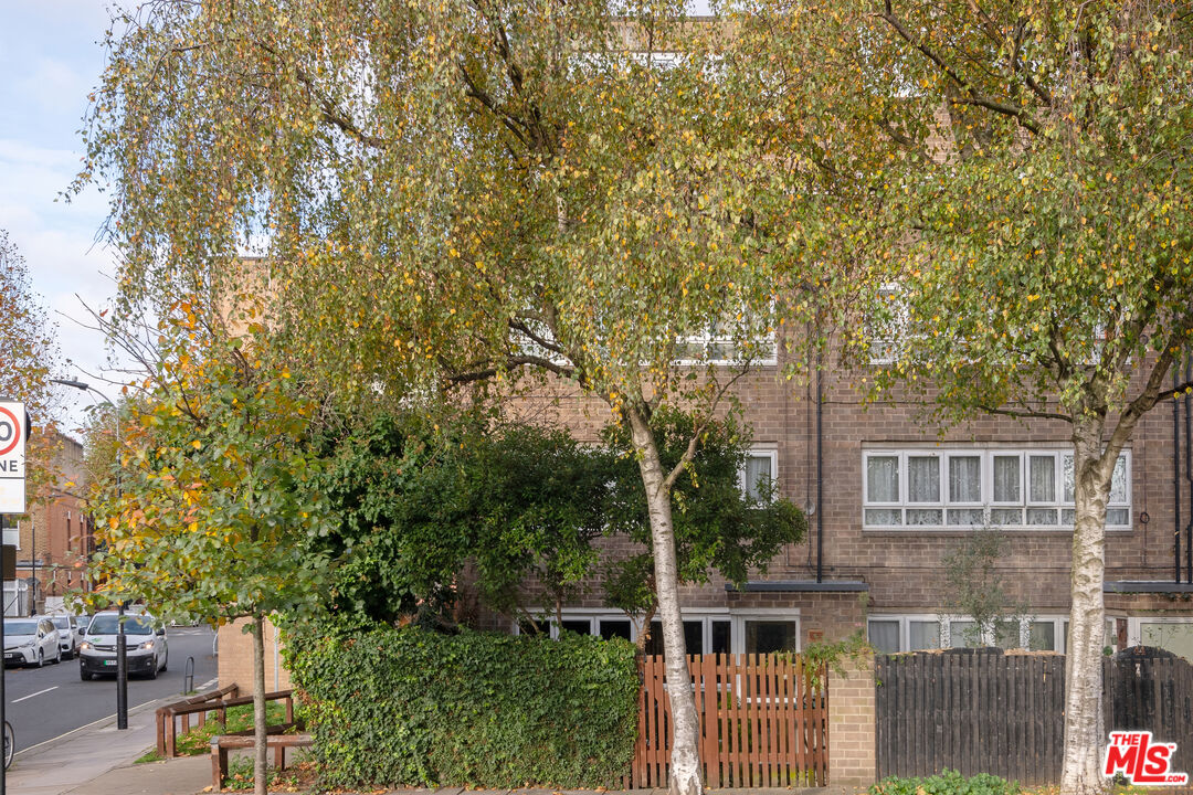 a house with a tree in front of it