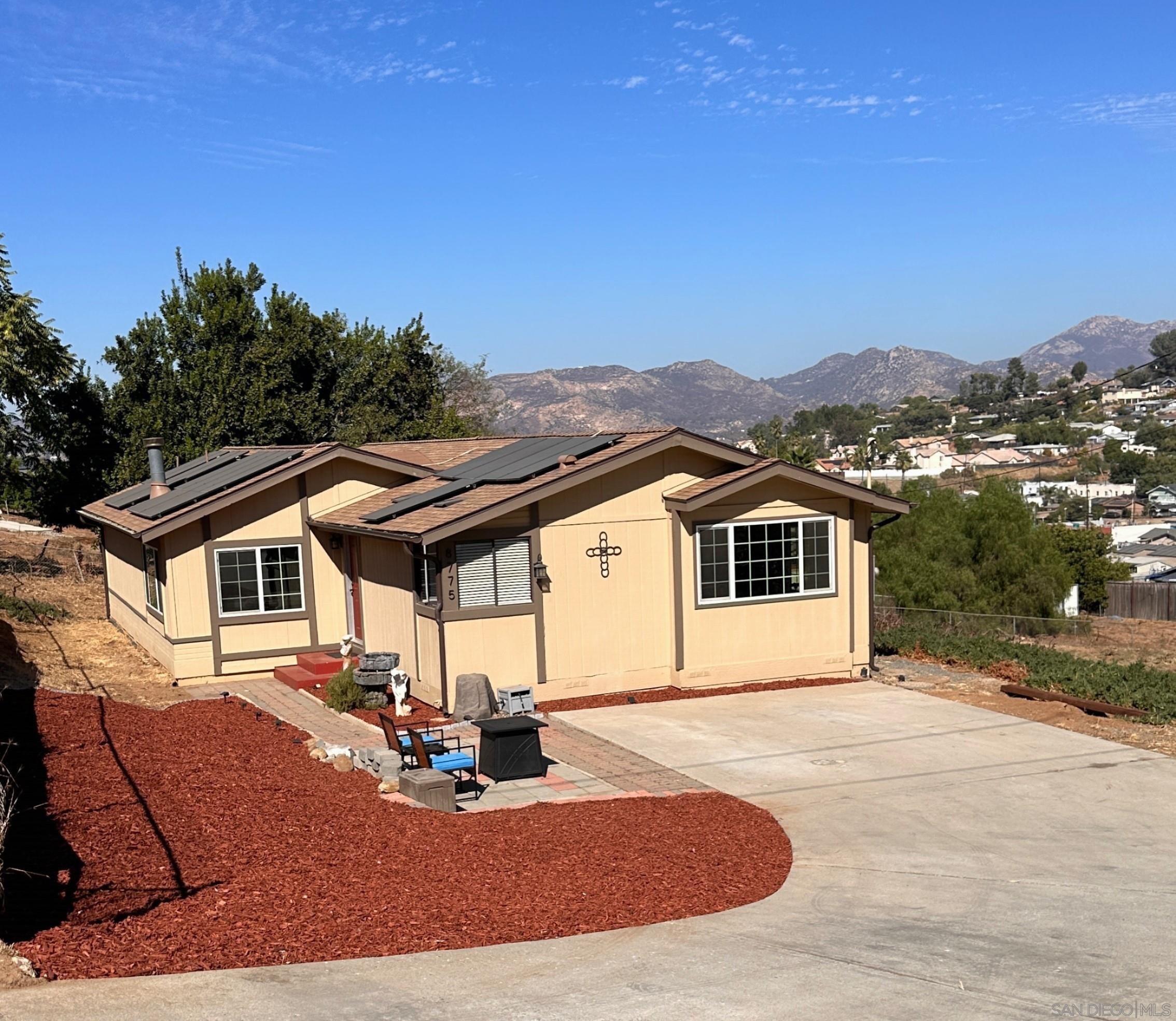 a view of a house with a patio