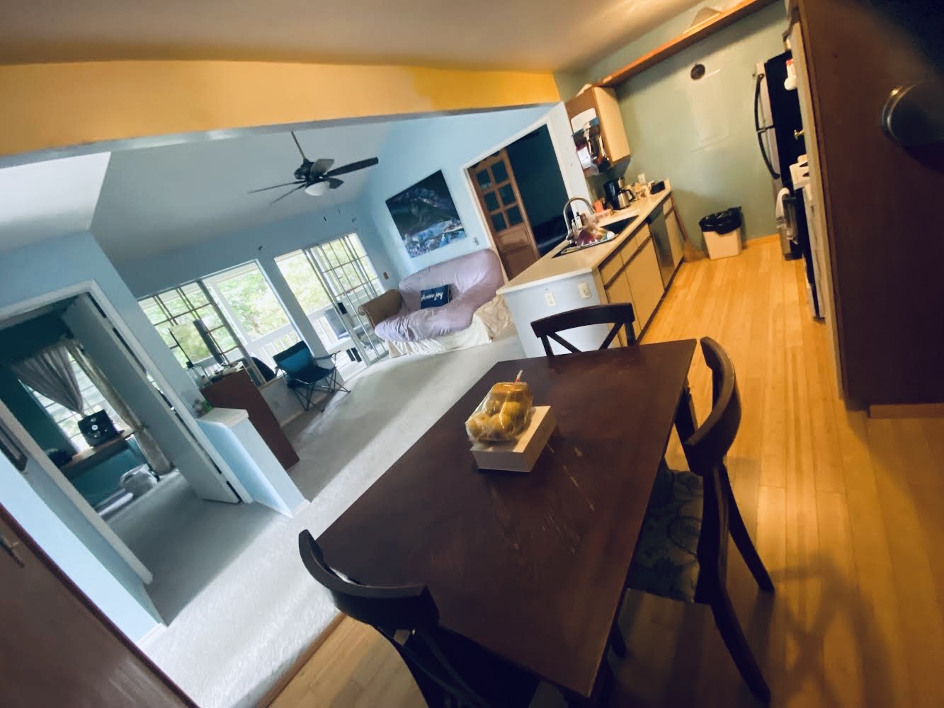 a view of living room with furniture and a flat screen tv