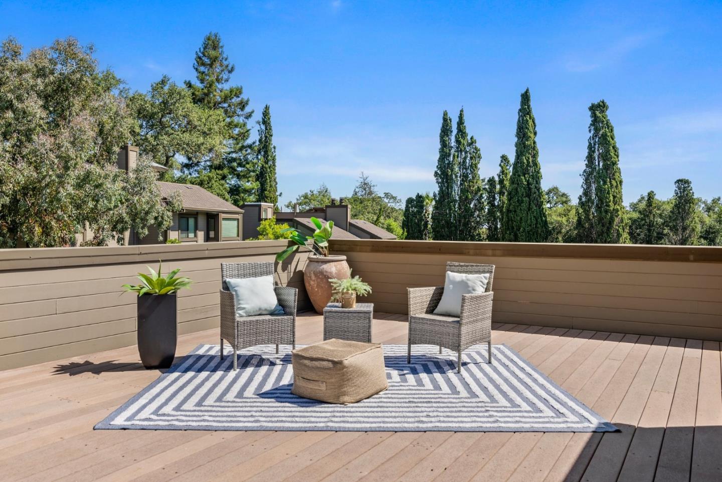 a view of a patio on the roof deck