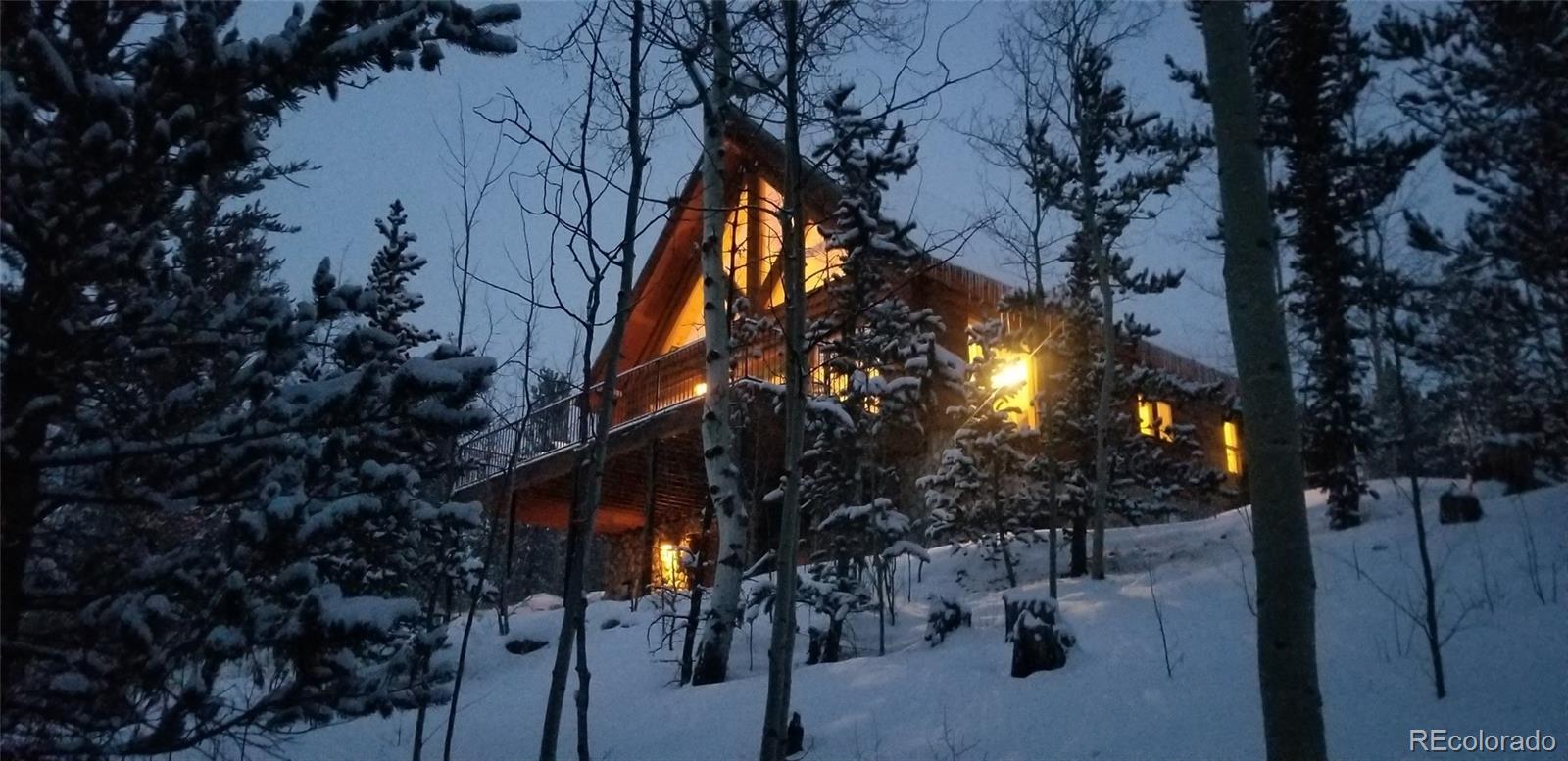 a view of a house with a tree