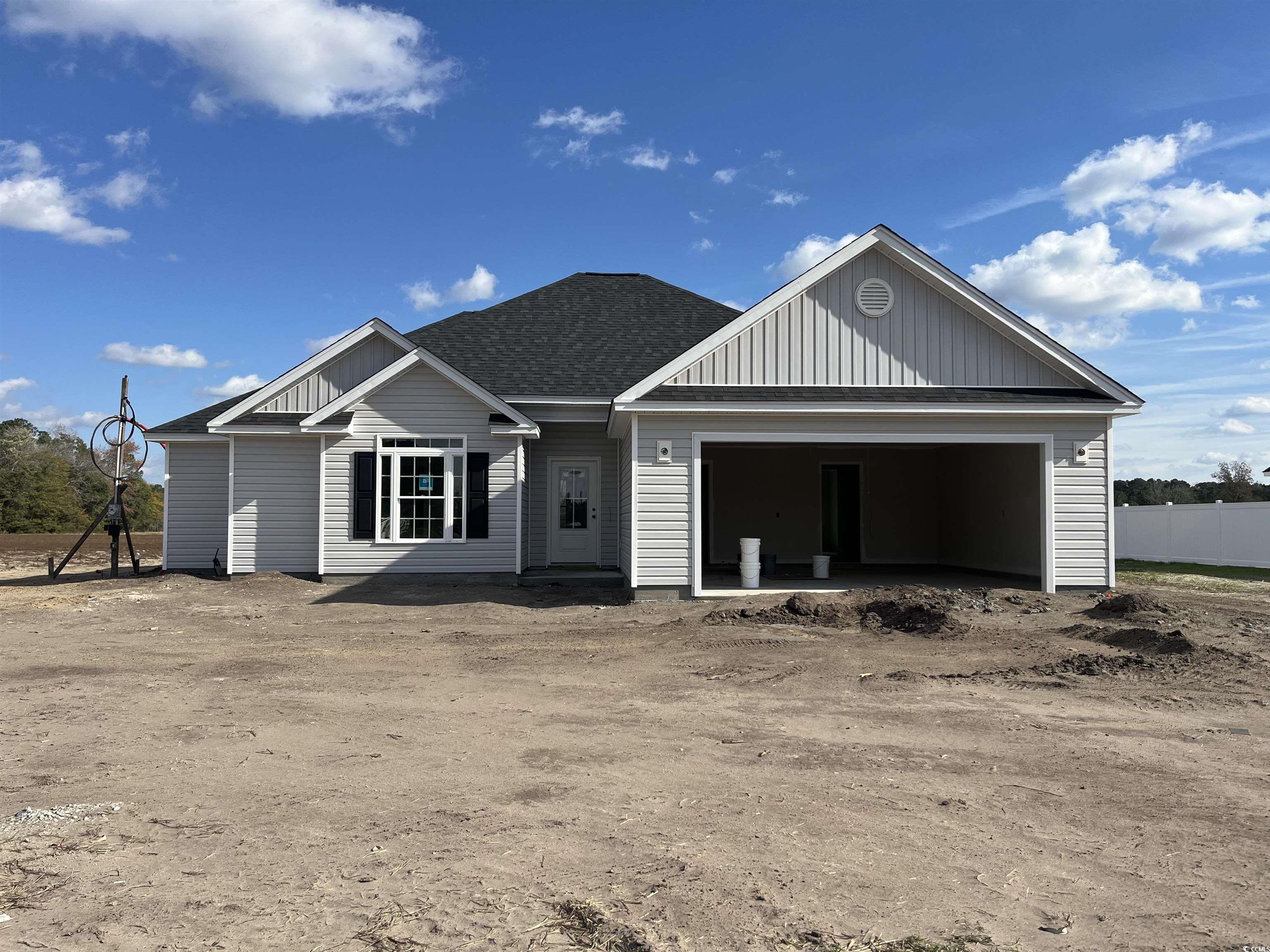 View of front of home with a garage