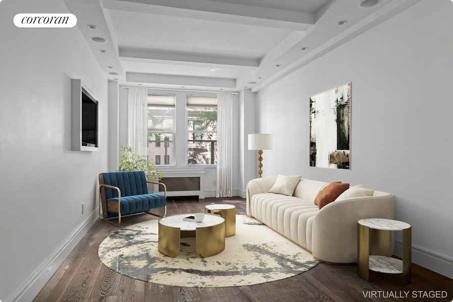 a living room with furniture and a potted plant