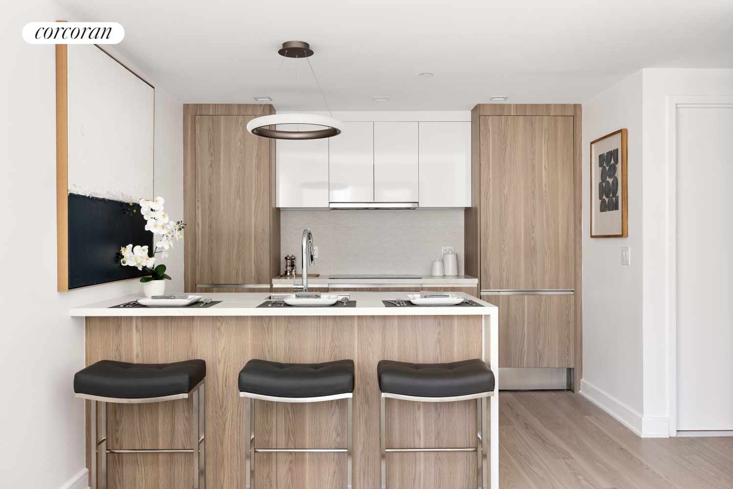 a kitchen with a stove and a refrigerator