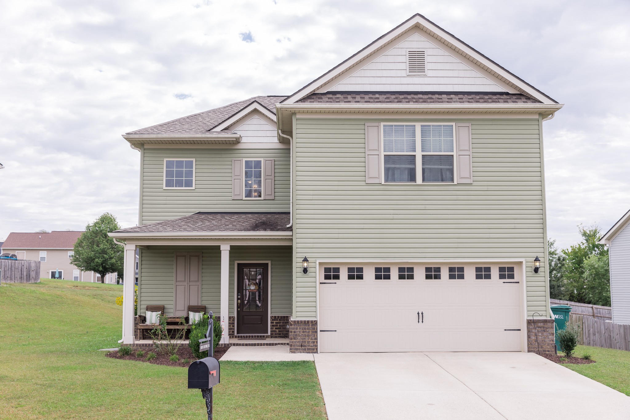 front view of a house with a yard