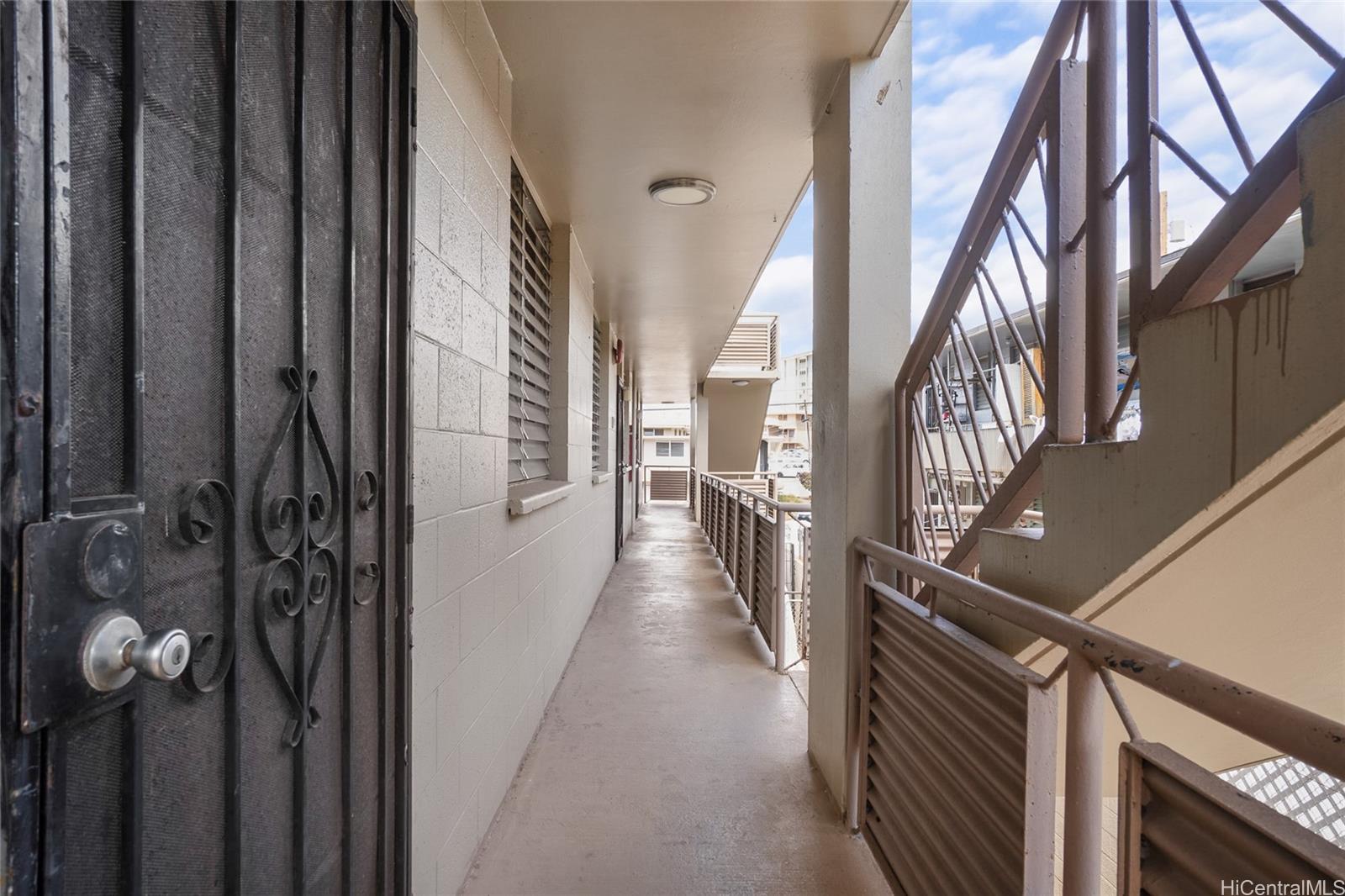 a view of a hallway with staircase