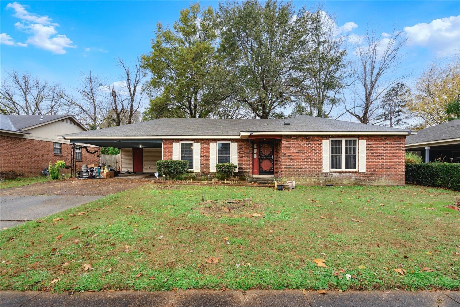 front view of a house with a yard