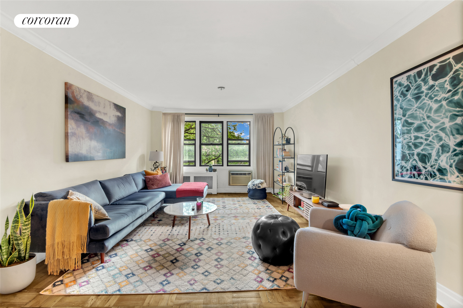 a living room with furniture and a window