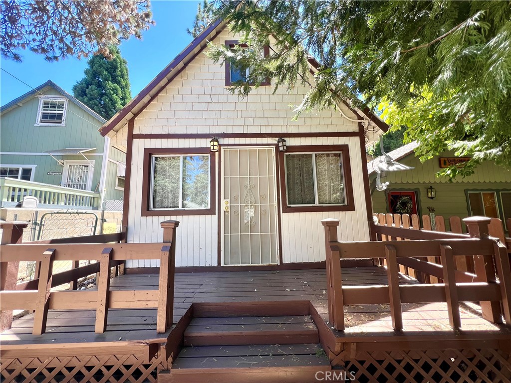 a house view with outdoor seating space