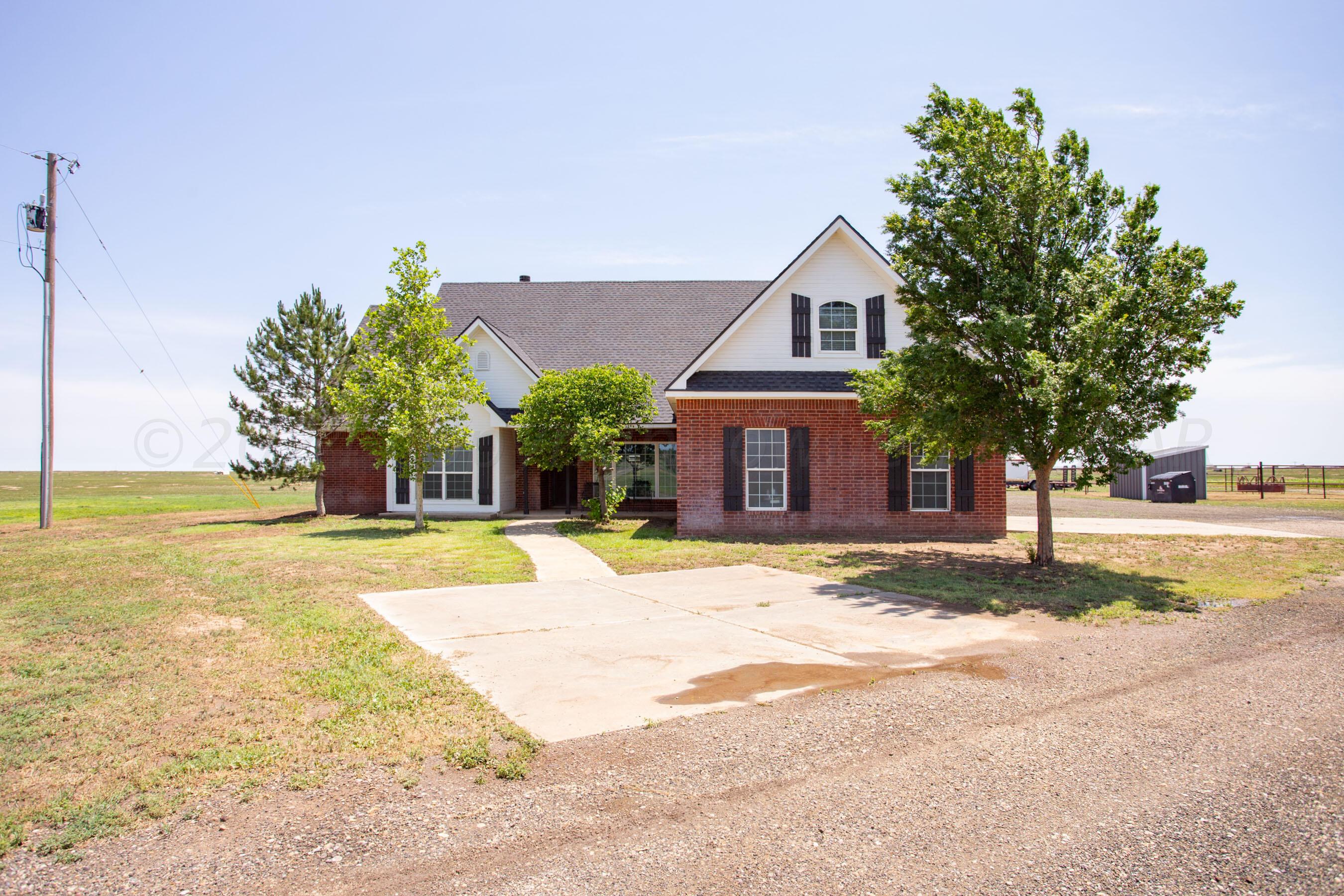 a house with trees in front of it