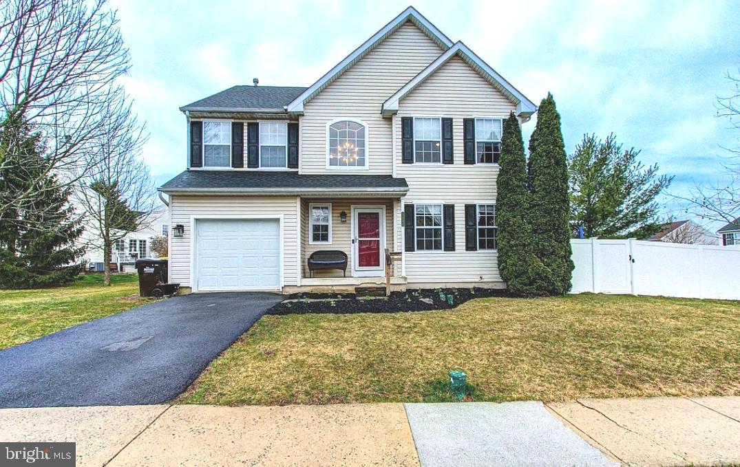 a view of house and outdoor space with yard