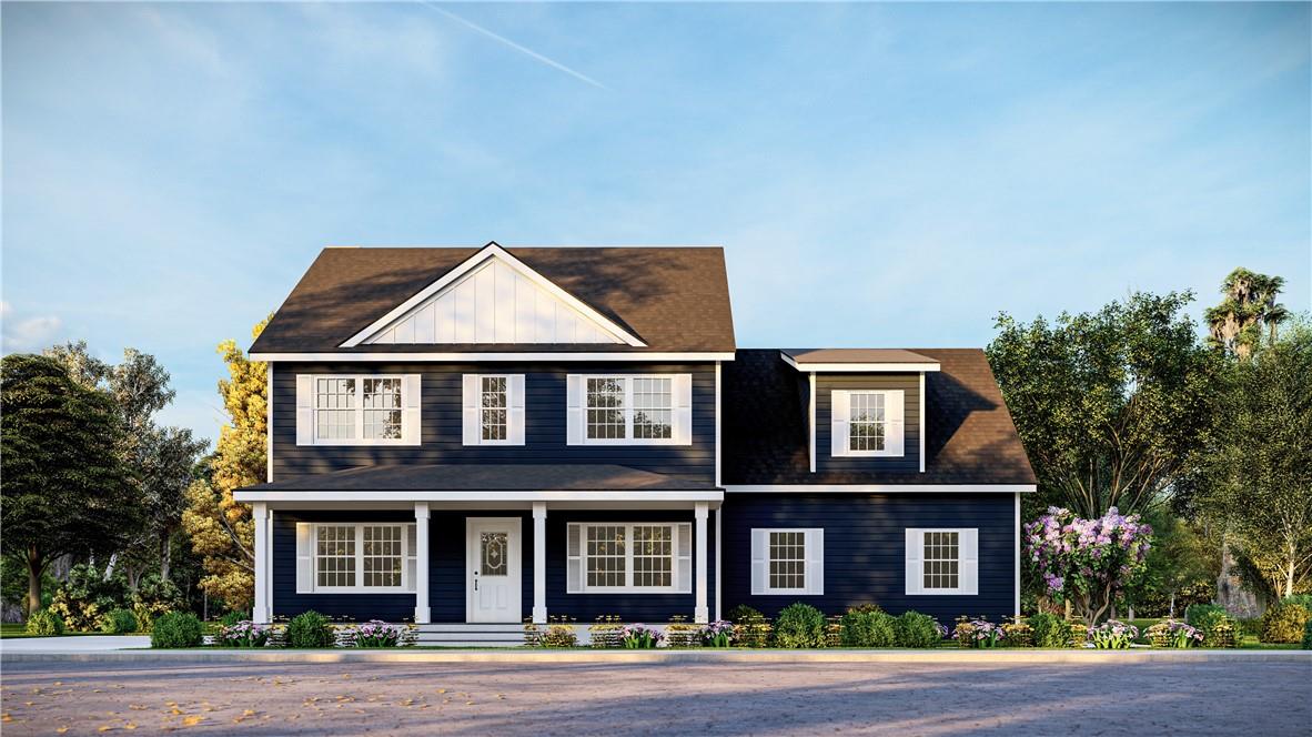 Colonial house featuring covered porch