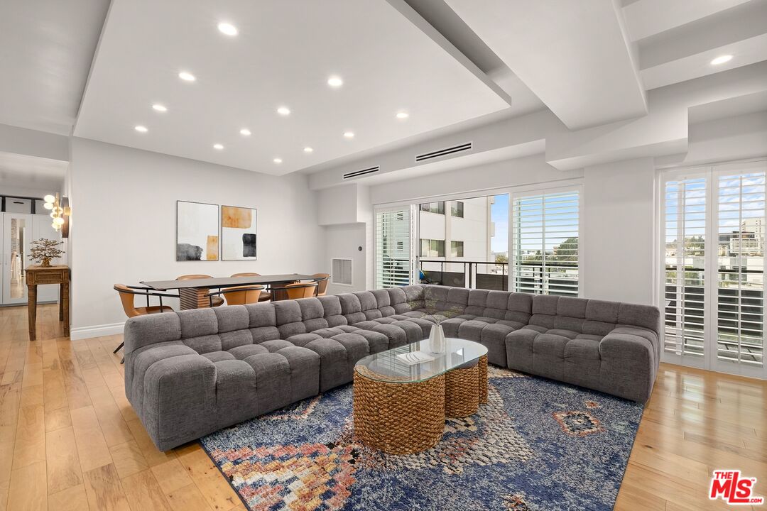 a living room with furniture and a couch