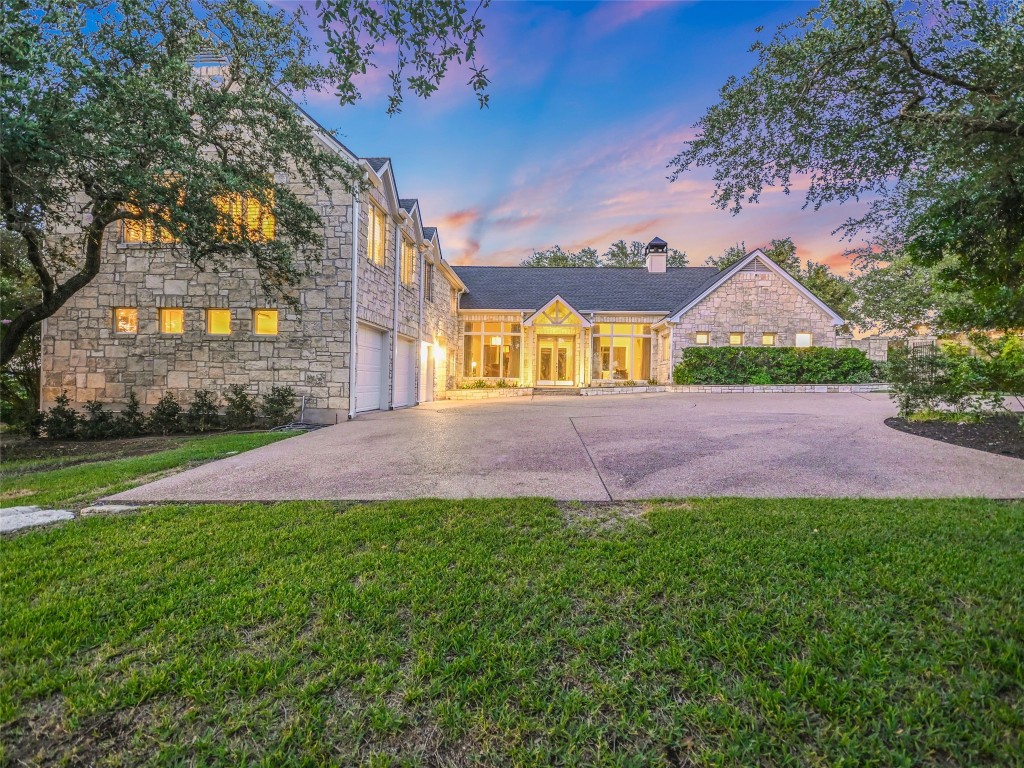 a view of an house with a big yard