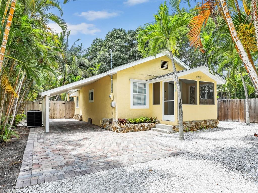 View of front of property featuring cooling unit